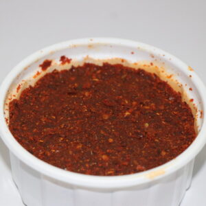 kashmiri red chilli paste in a white box