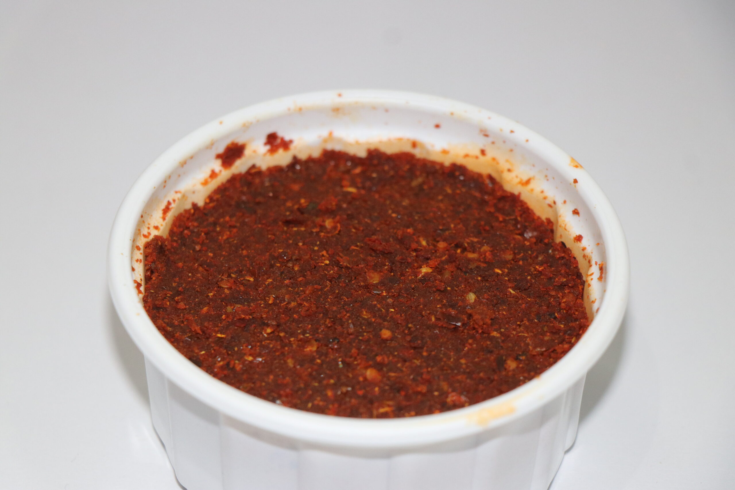 kashmir stuff kashmiri red chilli paste in a white box